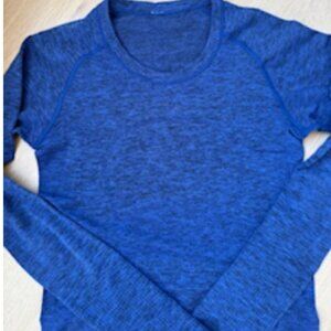 SWIFTY TECH LONG SLEEVE SHIRT 2.0 WAIST LENGHT SIZE: 4 BLUE / BLK